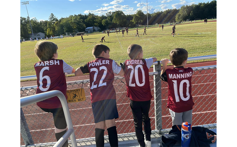 Hudson United Players Cheering on Hudson Varsity Boys